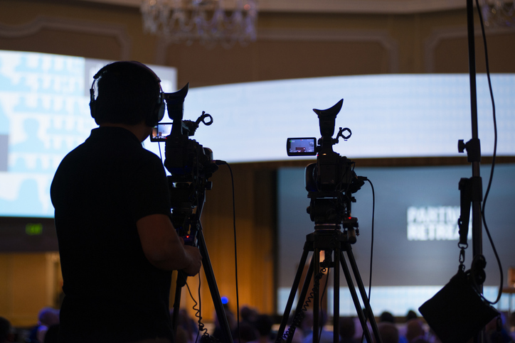 Cameraman recording an event