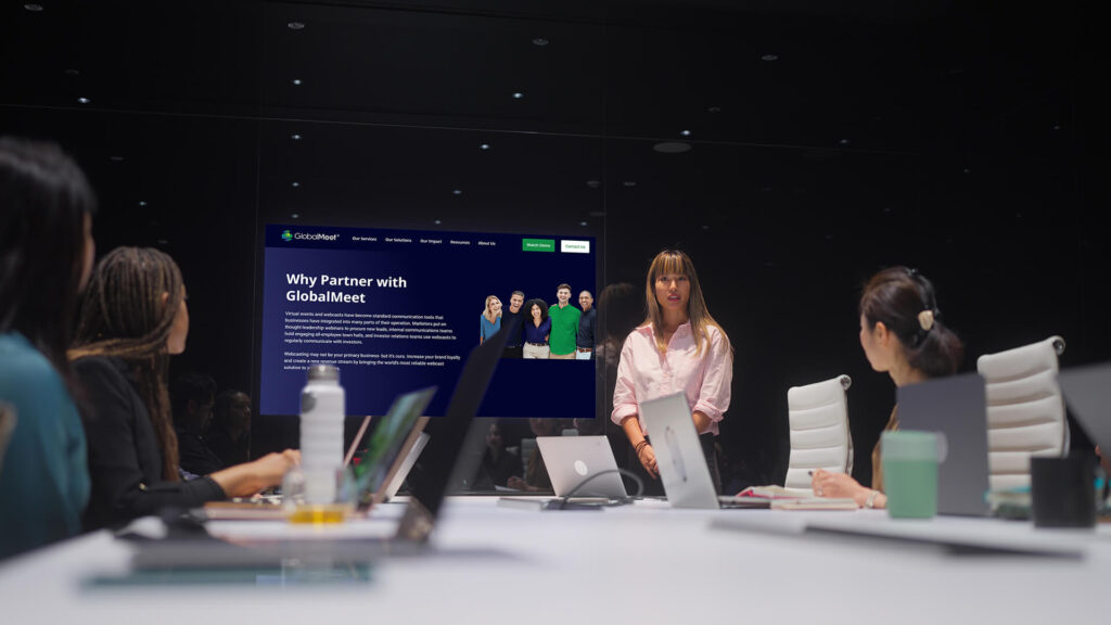 Businesswoman presenting to a group of office workers