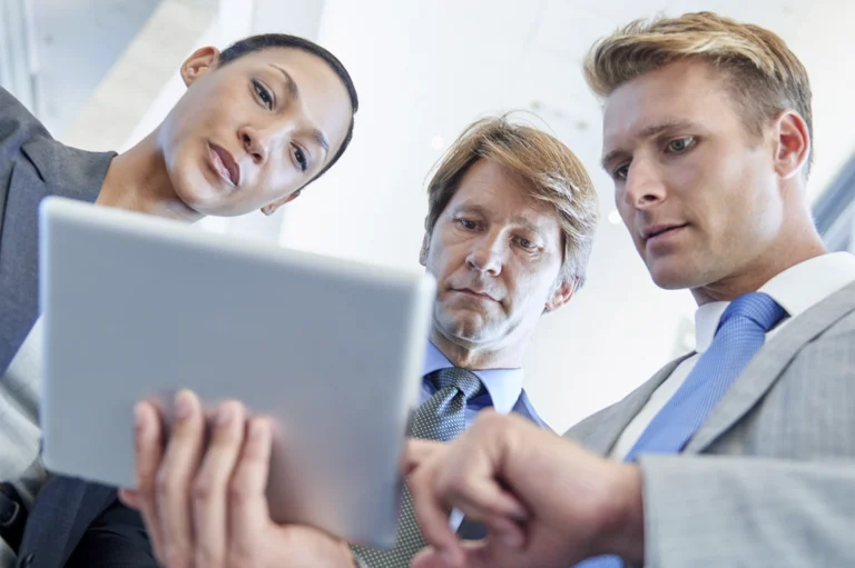 A group of business stakeholders engaged with GlobalMeet Webcasting software