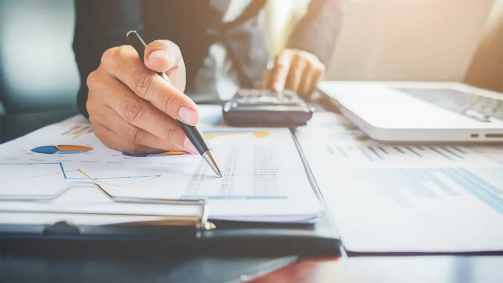 image of an account using a calculator